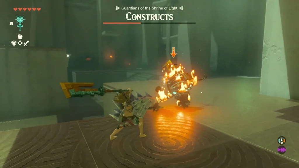 Construct burning on the leaf-strewn arena floor Construct burning on the leaf-strewn arena floor