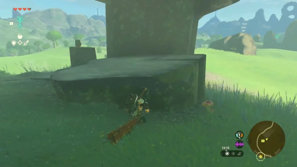 Mushroom-shaped rock pillar standing in the grass Mushroom-shaped rock pillar standing in the grass
