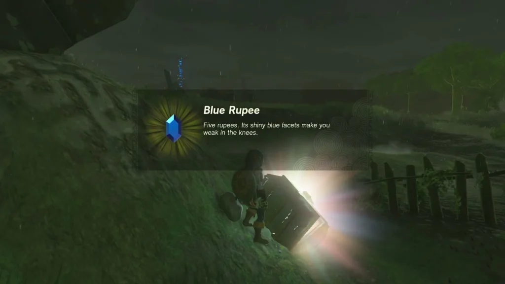 Blue Rupee item box from the chest beside the wooden fence Blue Rupee item box from the chest beside the wooden fence