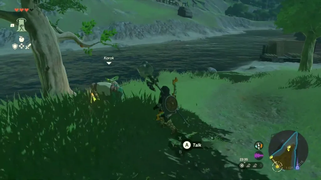 Korok standing under a tree on the riverbank, wanting to reach its friend Korok standing under a tree on the riverbank, wanting to reach its friend