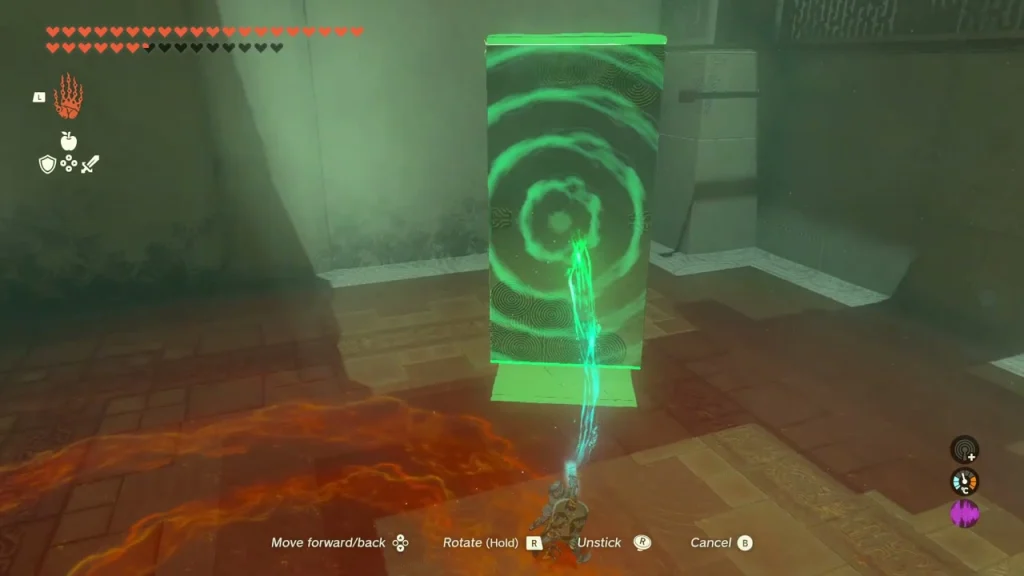 Green stone slab held with Ultrahand over an orange build zone Green stone slab held with Ultrahand over an orange build zone