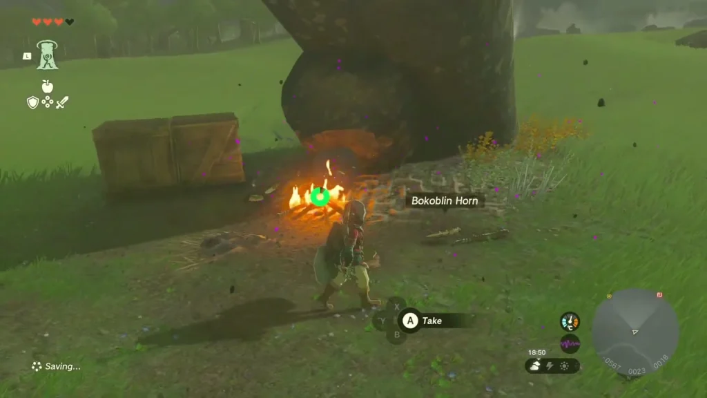 Campfire at the foot of the leaning boulder with a Bokoblin Horn lying beside it Campfire at the foot of the leaning boulder with a Bokoblin Horn lying beside it