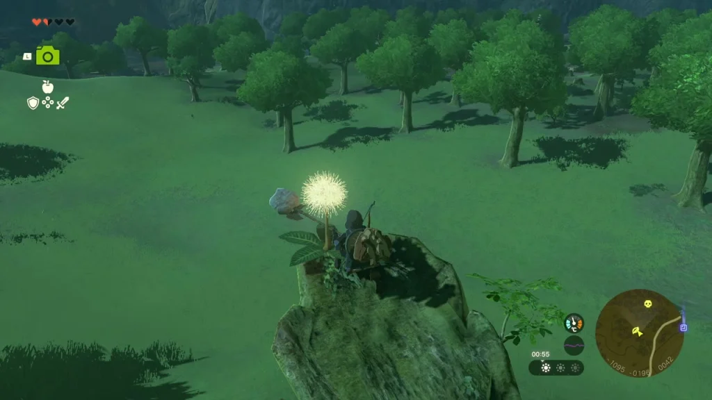 Glowing dandelion on top of the rock pillar Glowing dandelion on top of the rock pillar