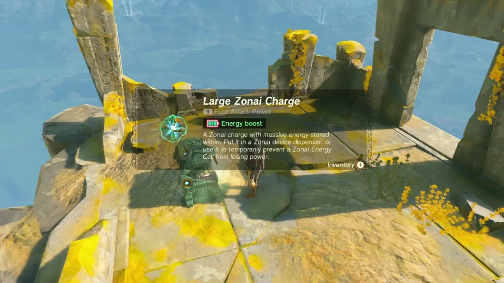 Large Zonai Charge item card on a mossy stone floor beside a Zonai statue Large Zonai Charge item card on a mossy stone floor beside a Zonai statue