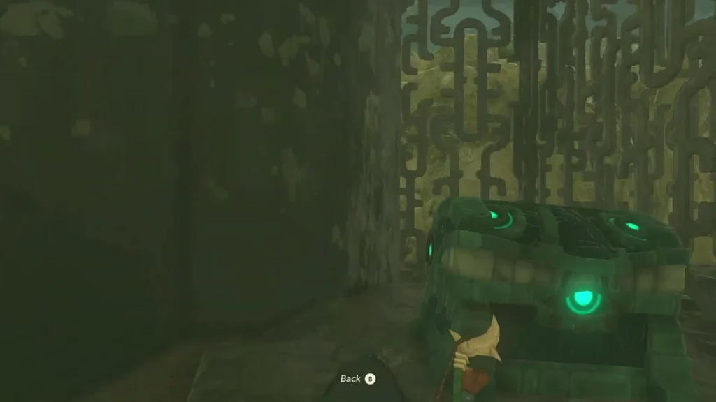Treasure chest standing at the back of a narrow stone passage Treasure chest standing at the back of a narrow stone passage