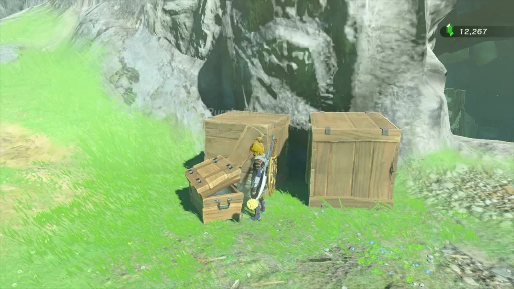 Wooden crates and a chest stacked against a rock on the hillside Wooden crates and a chest stacked against a rock on the hillside