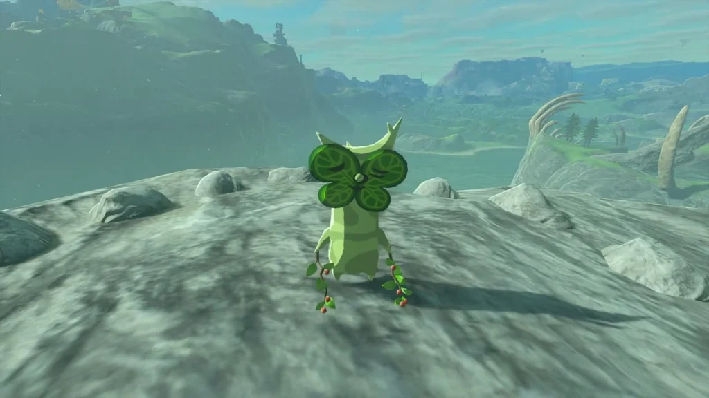 Korok standing on a cliff beside the completed ring of pale stones Korok standing on a cliff beside the completed ring of pale stones