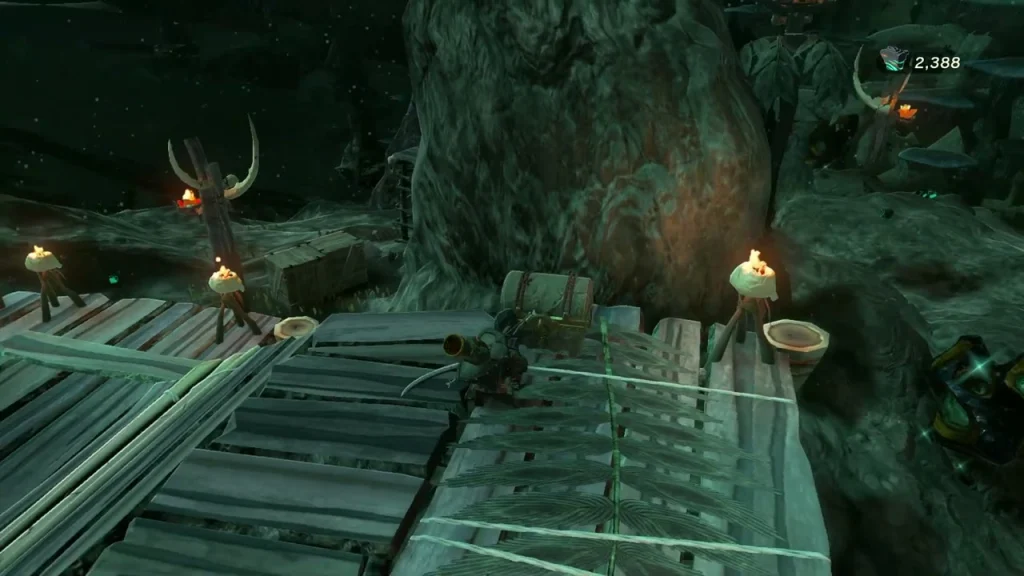 Chest on the wooden walkway between two torches Chest on the wooden walkway between two torches