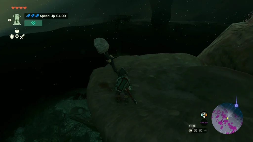Standing on a rock ledge under a dark overhang near the top Standing on a rock ledge under a dark overhang near the top