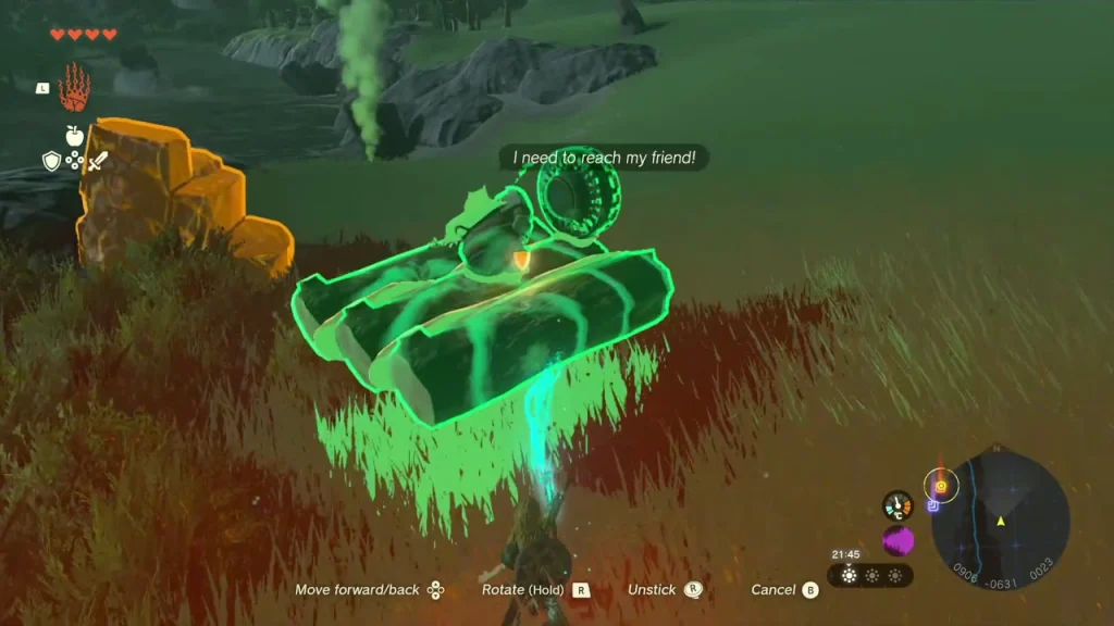 Log raft with the Korok being carried up the bank toward the green smoke Log raft with the Korok being carried up the bank toward the green smoke