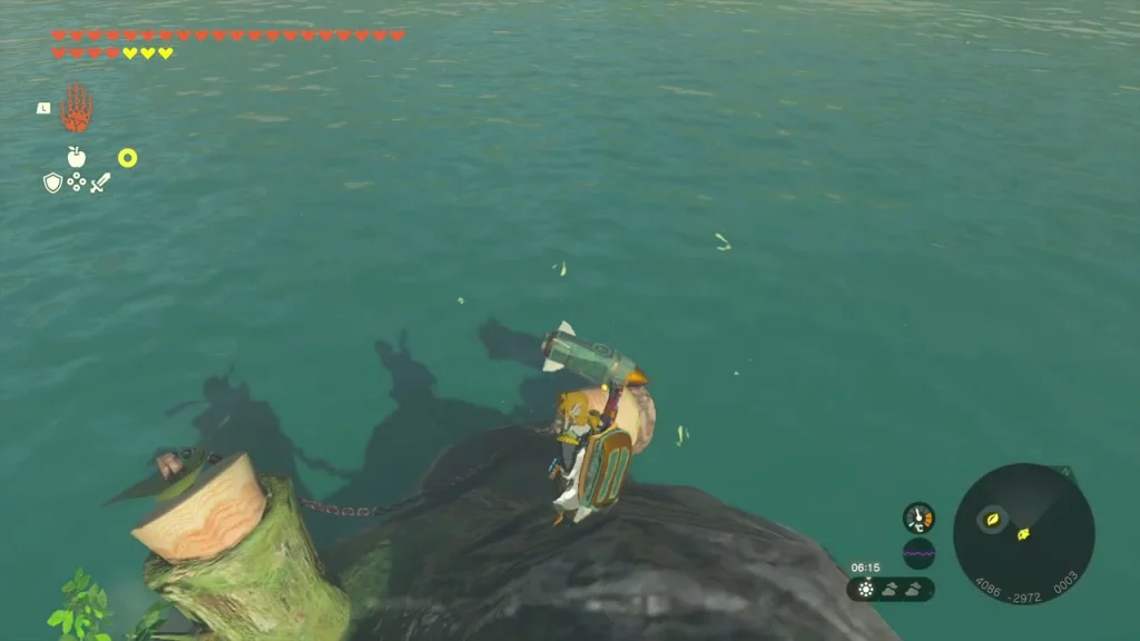 Rock in the sea with a tree stump and a plug Rock in the sea with a tree stump and a plug