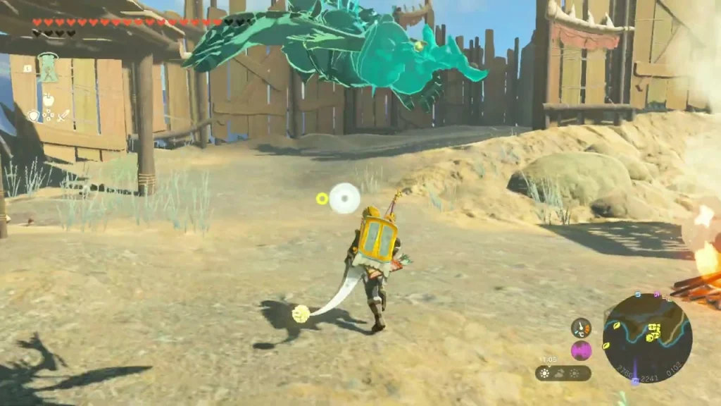 Bokoblin camp yard with a bonfire and a Zonai dragon passing overhead Bokoblin camp yard with a bonfire and a Zonai dragon passing overhead