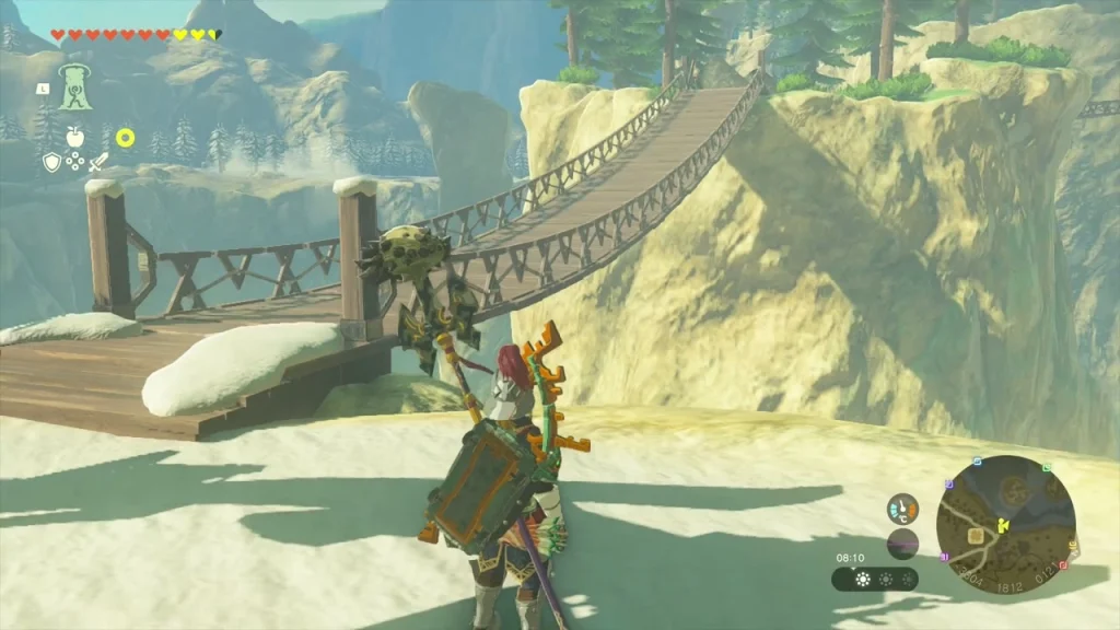 Quest complete banner in front of the repaired rope bridge