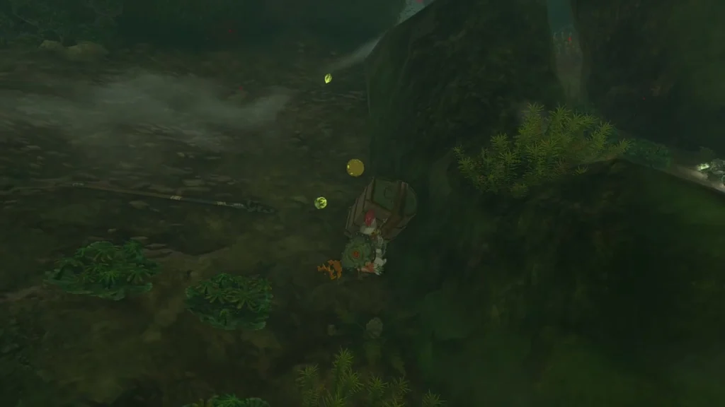 Chest glowing in the undergrowth of a dark grassy cavern