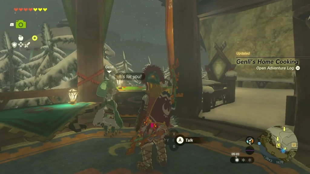 Genli standing beside her table inside The Slippery Falcon with a quest update on screen Genli standing beside her table inside The Slippery Falcon with a quest update on screen