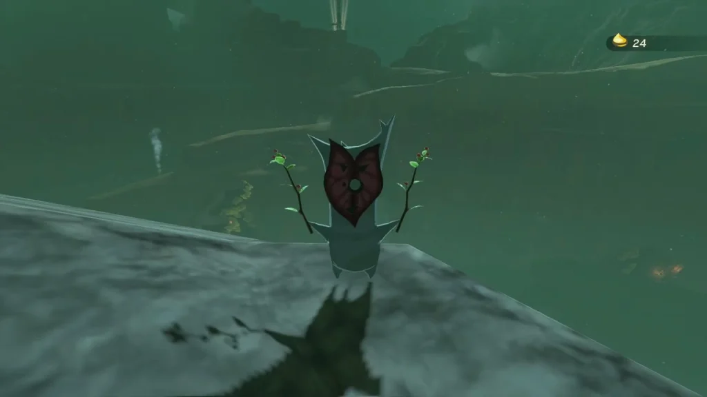 Korok on a snowy rock holding its seed Korok on a snowy rock holding its seed
