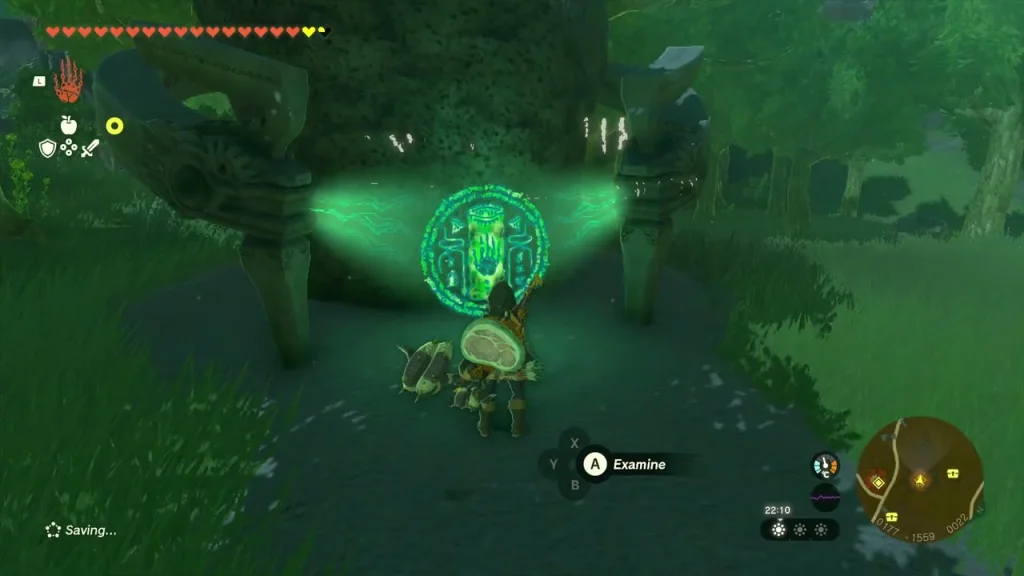 Green glowing shrine door of Kamizun Shrine between two stone pillars Green glowing shrine door of Kamizun Shrine between two stone pillars