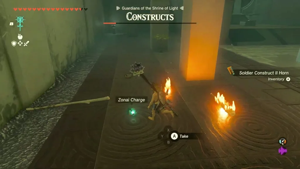 Soldier Construct Horn drop and Zonai Charge on the shrine floor Soldier Construct Horn drop and Zonai Charge on the shrine floor