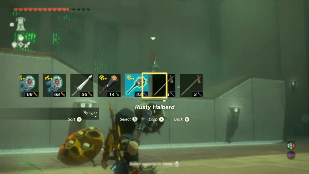 Weapon menu with a Rusty Halberd selected to throw inside Teniten Shrine Weapon menu with a Rusty Halberd selected to throw inside Teniten Shrine