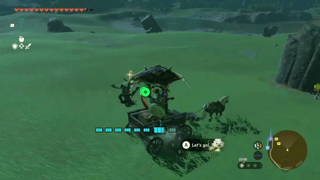 Wagon parked on open grass with a chest in its bed Wagon parked on open grass with a chest in its bed