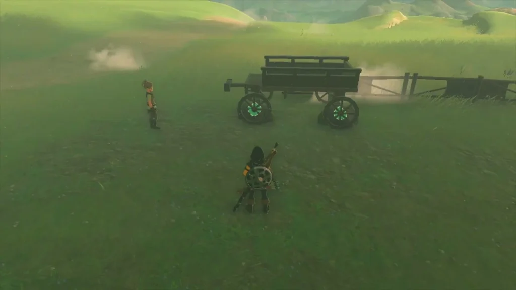 Repaired wagon with both wheels glowing green on the grass Repaired wagon with both wheels glowing green on the grass