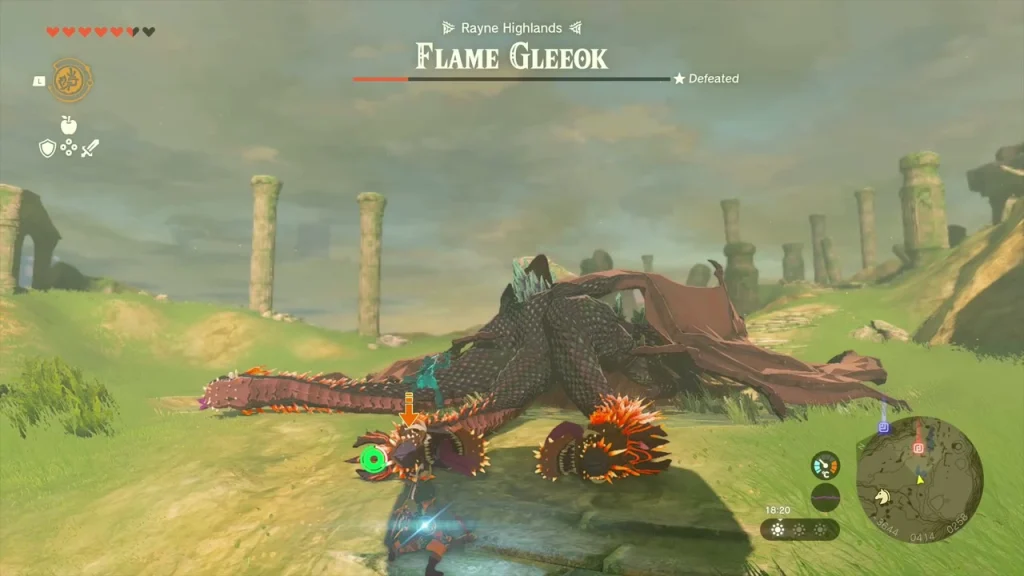 Defeated Flame Gleeok lying in the grass among the ruined Ancient Columns Defeated Flame Gleeok lying in the grass among the ruined Ancient Columns