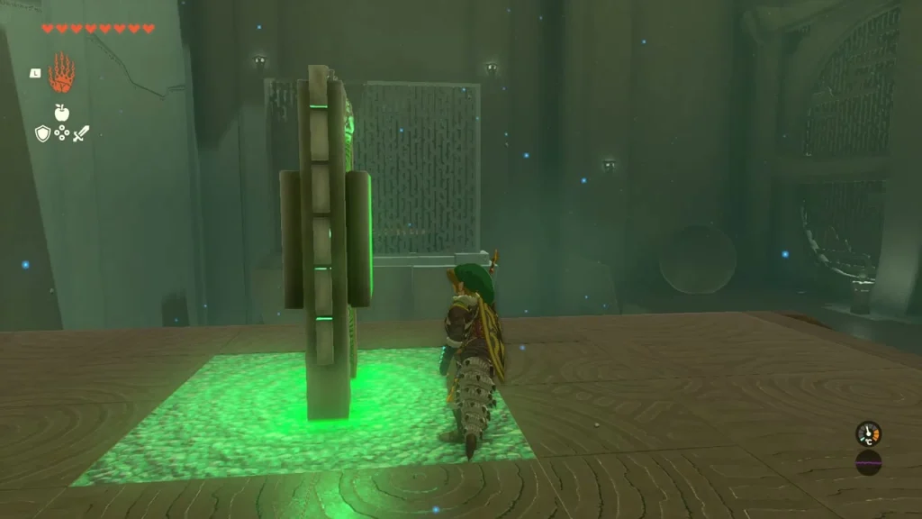 Green gravity device on a glowing floor panel in Tenbez Shrine Green gravity device on a glowing floor panel in Tenbez Shrine