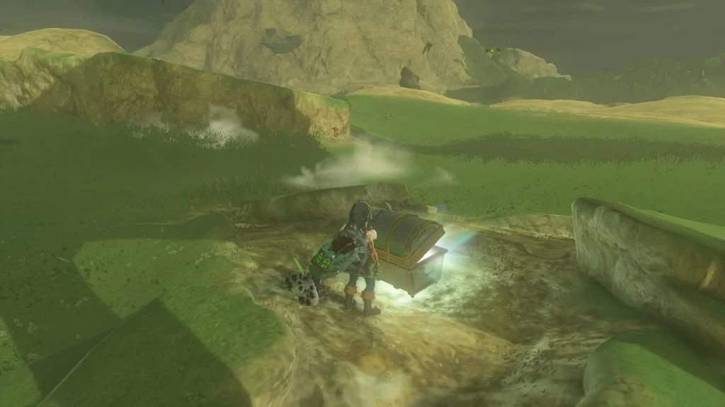 Glowing chest in a dip in the ridge with crumbled earth around it Glowing chest in a dip in the ridge with crumbled earth around it
