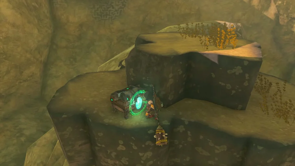 Chest with a glowing latch on top of a carved Zonai stone ruin Chest with a glowing latch on top of a carved Zonai stone ruin