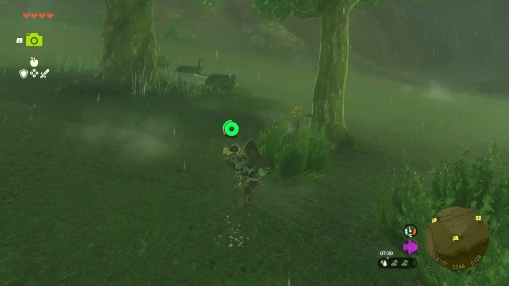 Green marker over a flower trail on dark rain-soaked grass Green marker over a flower trail on dark rain-soaked grass