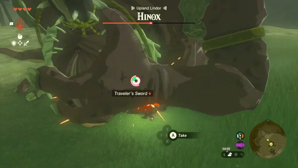 Hinox collapsed on the grass with its health bar and Traveler's Sword drop Hinox collapsed on the grass with its health bar and Traveler's Sword drop