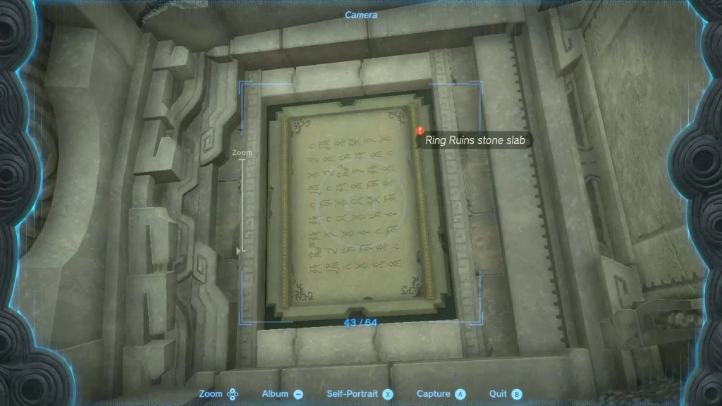 Stone slab with Zonai script set into the wall of a Ring Ruins chamber Stone slab with Zonai script set into the wall of a Ring Ruins chamber