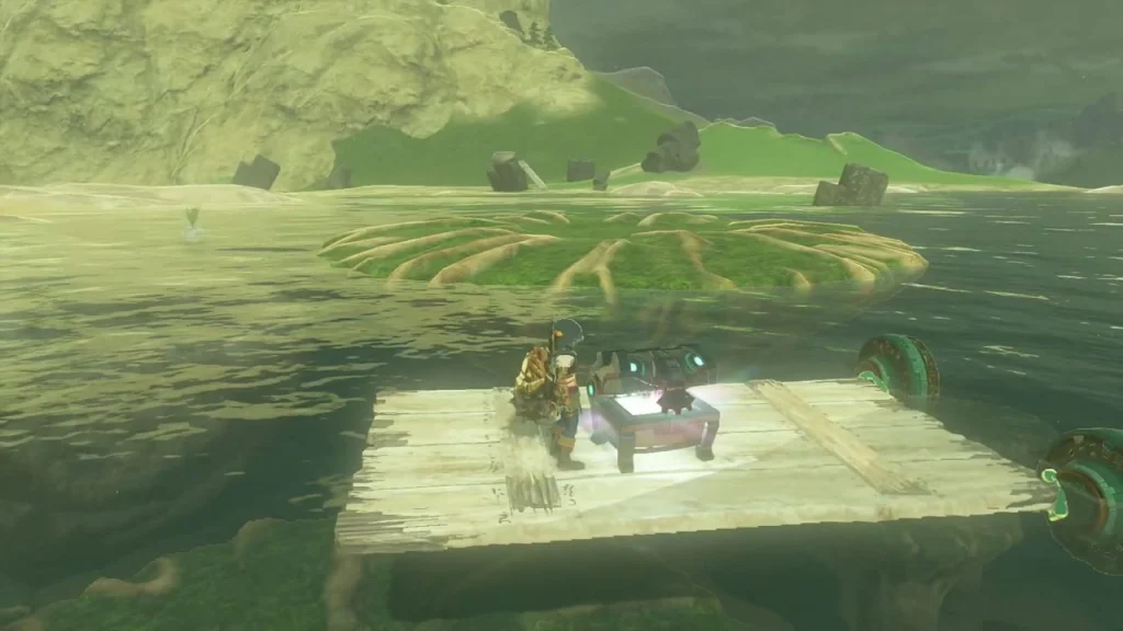 Wheeled raft holding a chest with a grassy islet behind
