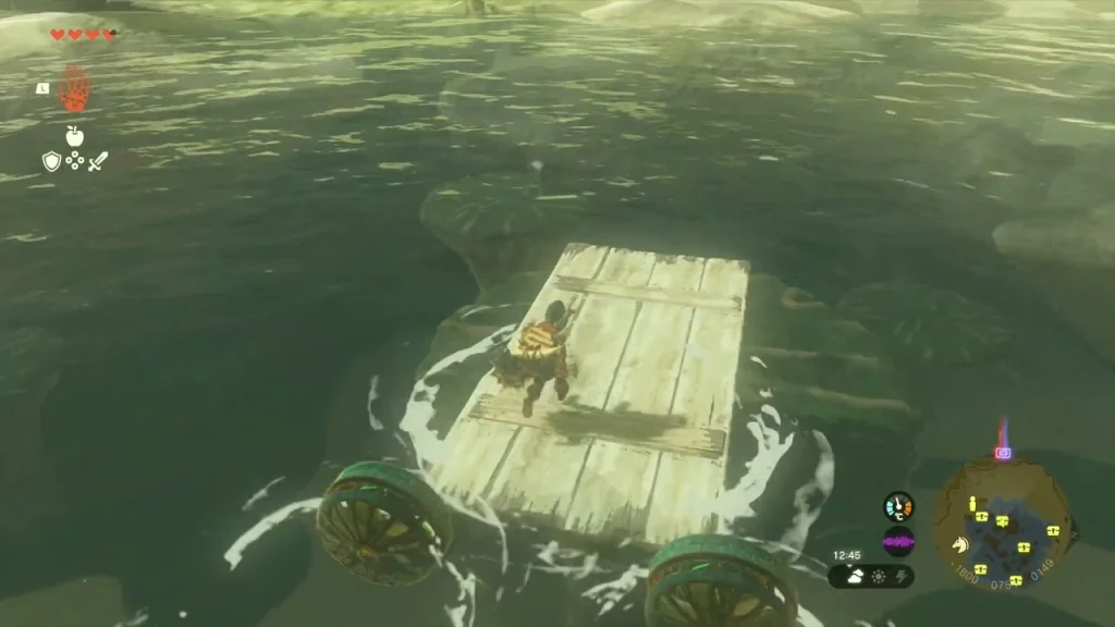 Plank raft with wheels moving through the dark lake water