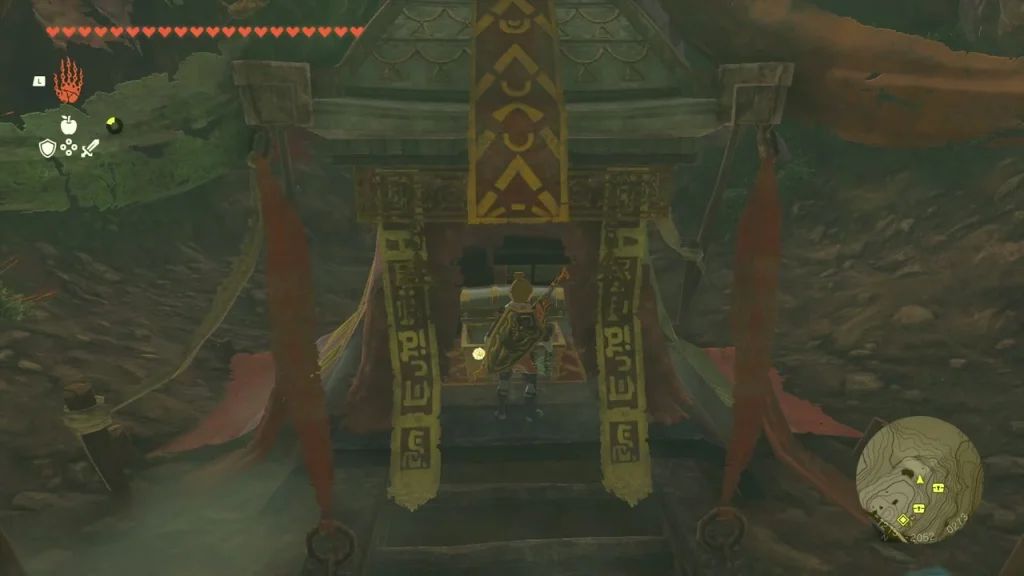 Banner-flanked treasure door at the back of the twin cave Banner-flanked treasure door at the back of the twin cave