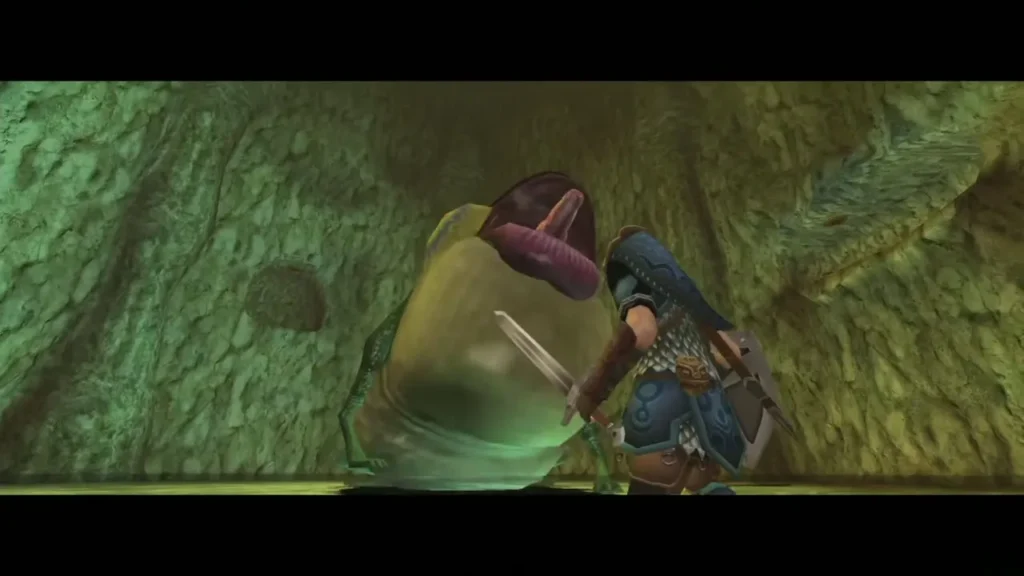 Link with sword drawn facing the open mouth of the Deku Toad Link with sword drawn facing the open mouth of the Deku Toad