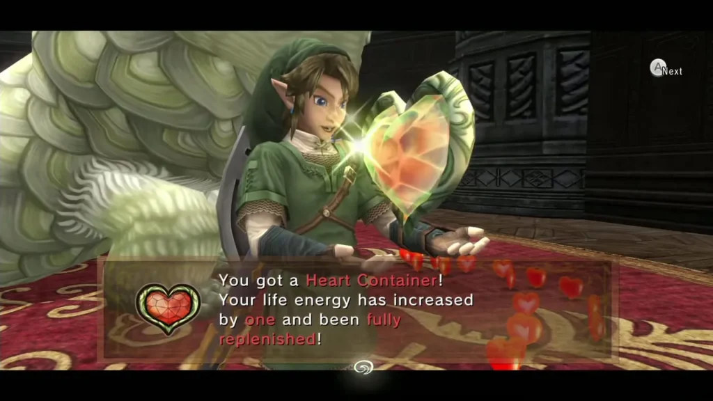 Link holding up a Heart Container with the item message box showing Link holding up a Heart Container with the item message box showing