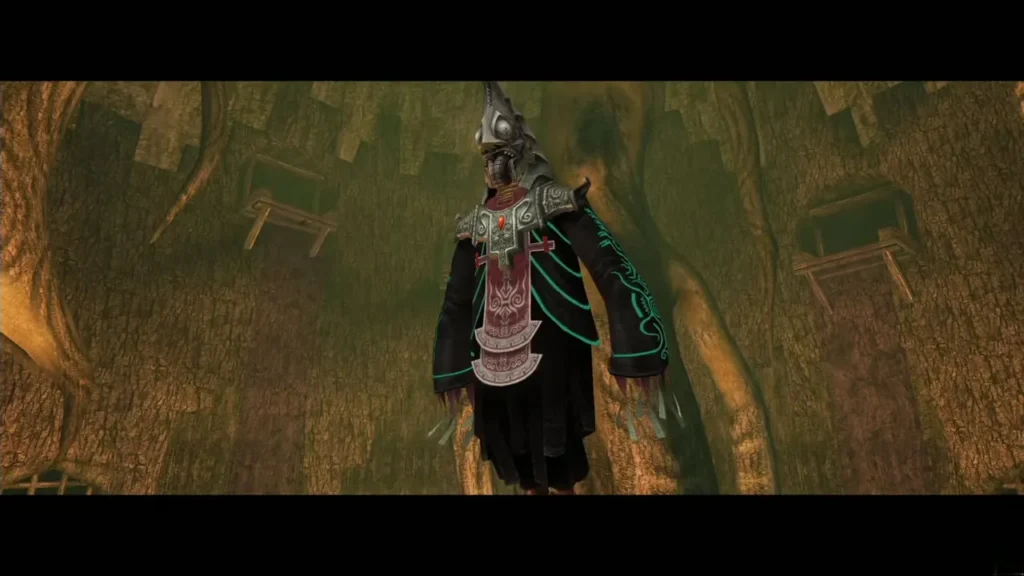 Zant standing in the green arena at the start of the first phase Zant standing in the green arena at the start of the first phase
