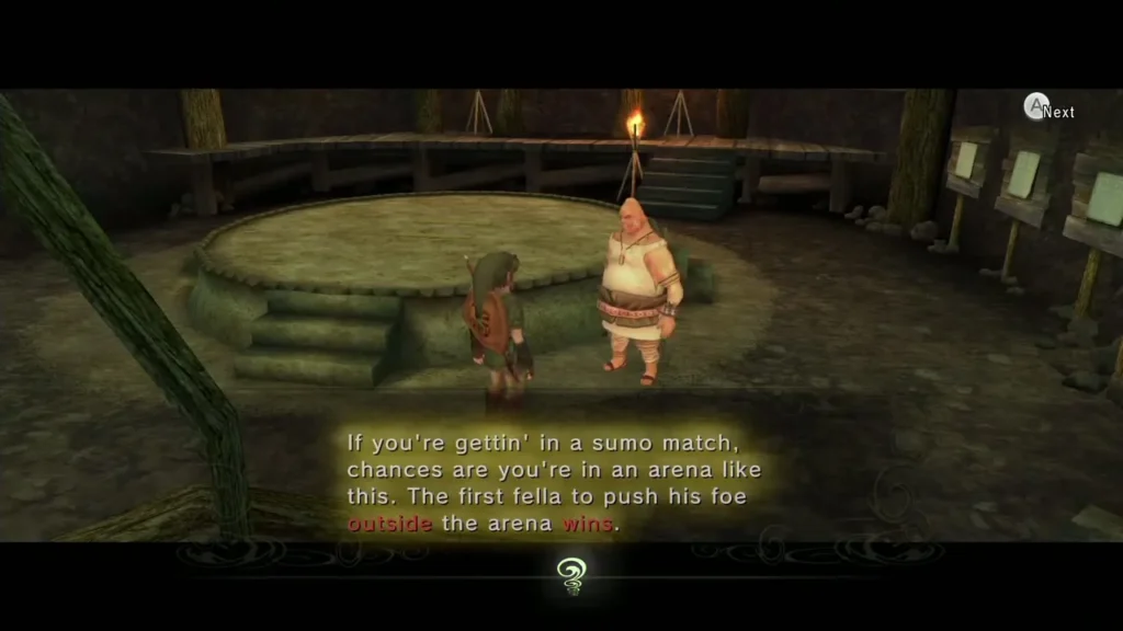 Mayor Bo explaining sumo beside Link in the sumo ring Mayor Bo explaining sumo beside Link in the sumo ring