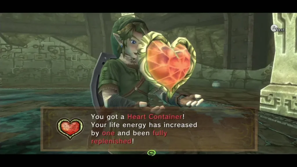 Link holds up a Heart Container after the Goron chief is freed in the mines Link holds up a Heart Container after the Goron chief is freed in the mines