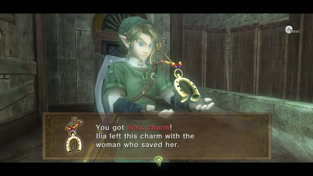 Link holding up Ilia's Charm with its name box Link holding up Ilia's Charm with its name box