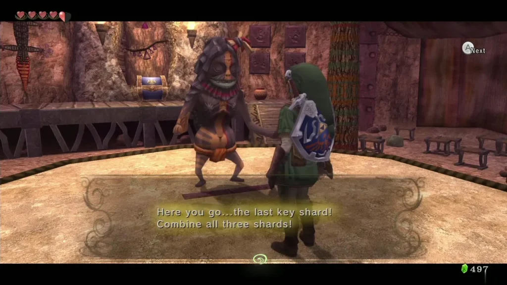 Gor Liggs handing Link the last Key Shard in the Goron Mines Gor Liggs handing Link the last Key Shard in the Goron Mines