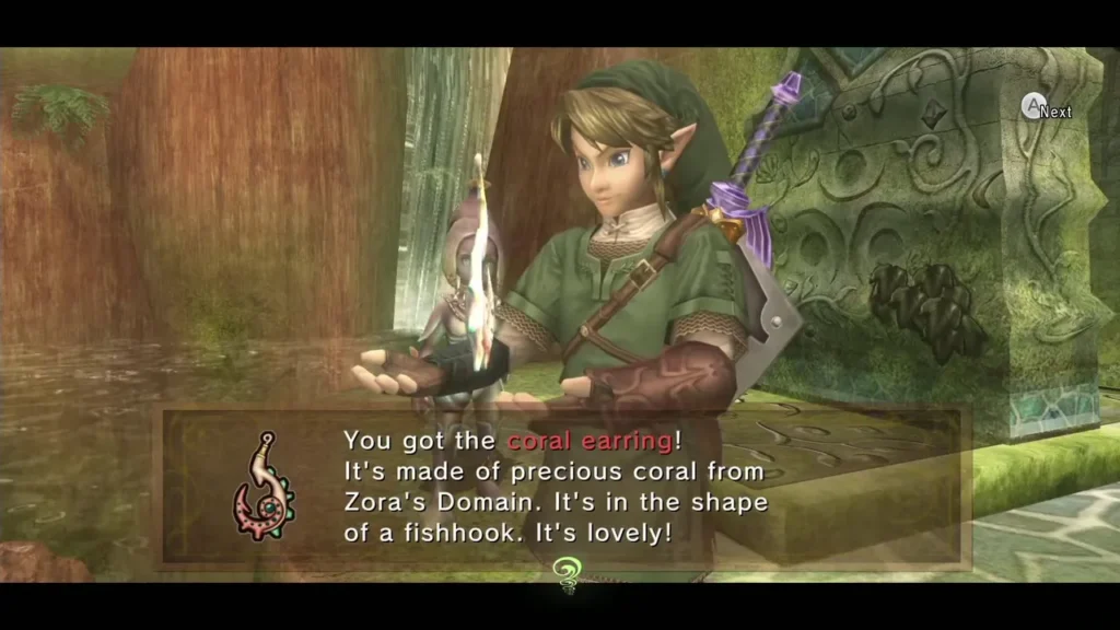 Link holding the Coral Earring with its message box beside a carved stone wall Link holding the Coral Earring with its message box beside a carved stone wall