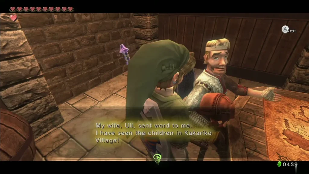 Rusl with a headband speaking to Link beside a table in Telma's Bar Rusl with a headband speaking to Link beside a table in Telma's Bar