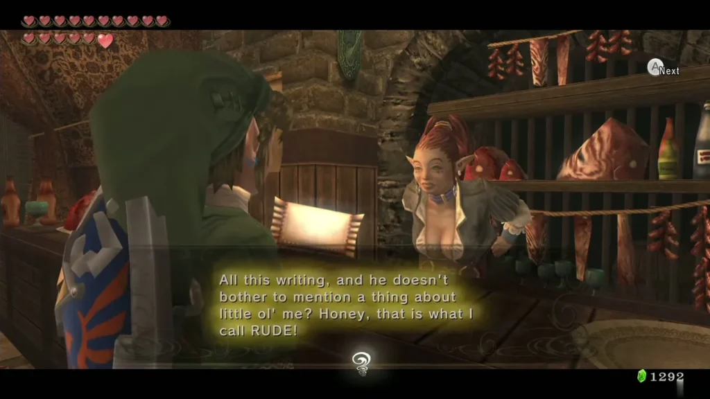 Link in his hood at the bar counter with Renado's letter lying in front of Telma Link in his hood at the bar counter with Renado's letter lying in front of Telma