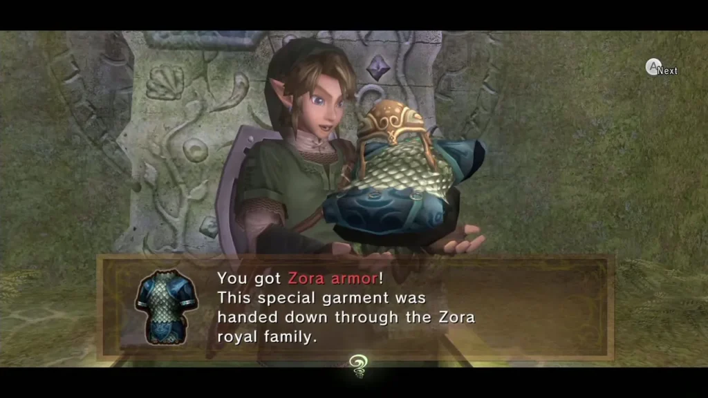 Link holding the Zora Armor with its message box beside a carved stone wall Link holding the Zora Armor with its message box beside a carved stone wall