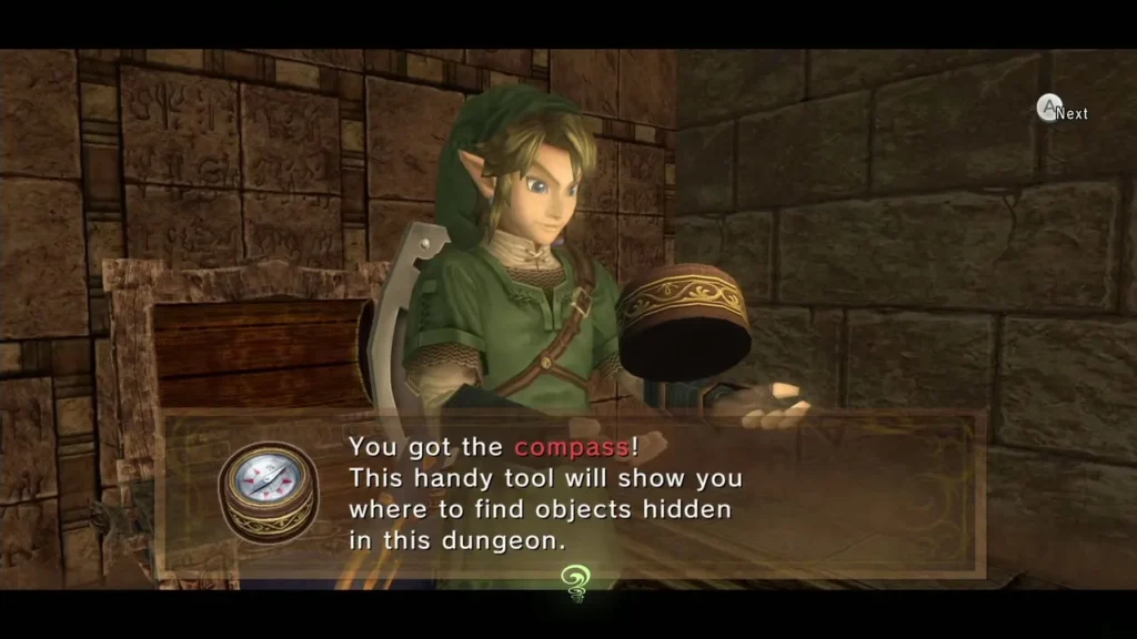 Link holding up the Compass with its message box in Arbiter's Grounds Link holding up the Compass with its message box in Arbiter's Grounds