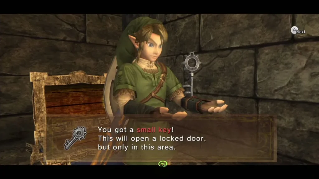 Link holding up a small key with its message box in a stone room Link holding up a small key with its message box in a stone room