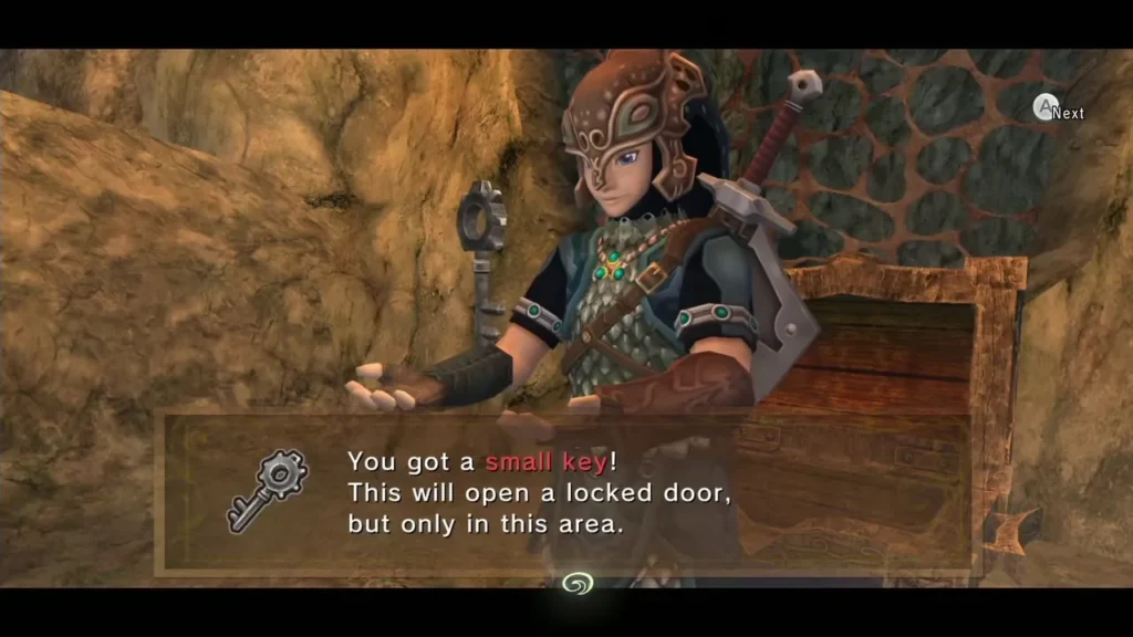 Link holding up Small Key 3 from a chest in the Lakebed Temple, with the item message on screen Link holding up Small Key 3 from a chest in the Lakebed Temple, with the item message on screen