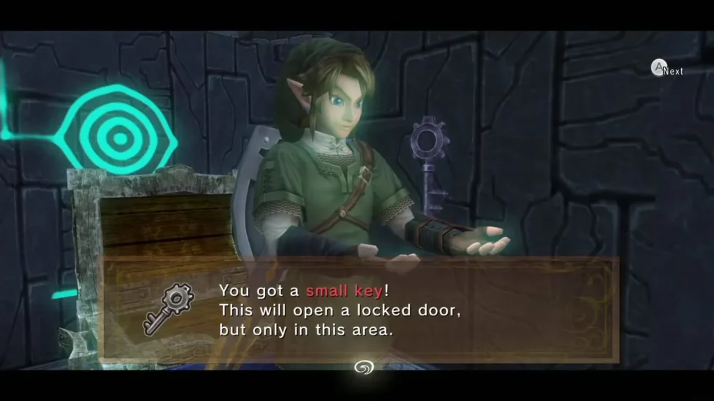 Link holding up a small key with its message box beside a glowing carved wall Link holding up a small key with its message box beside a glowing carved wall
